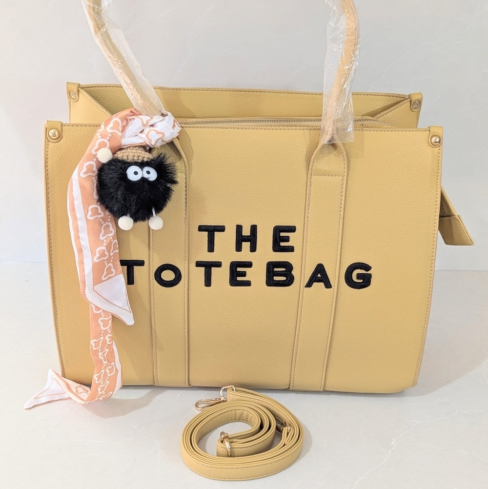 Beige Faux Leather Tote Bag with Decorative Scarf and Charm