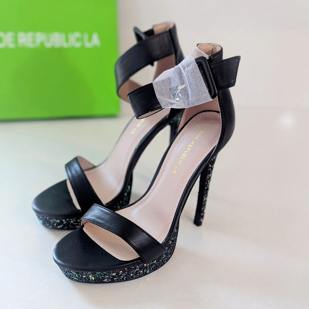 Shoe Republic LA Black Leather Ankle Strap High Heel Sandals with Glittered Sole