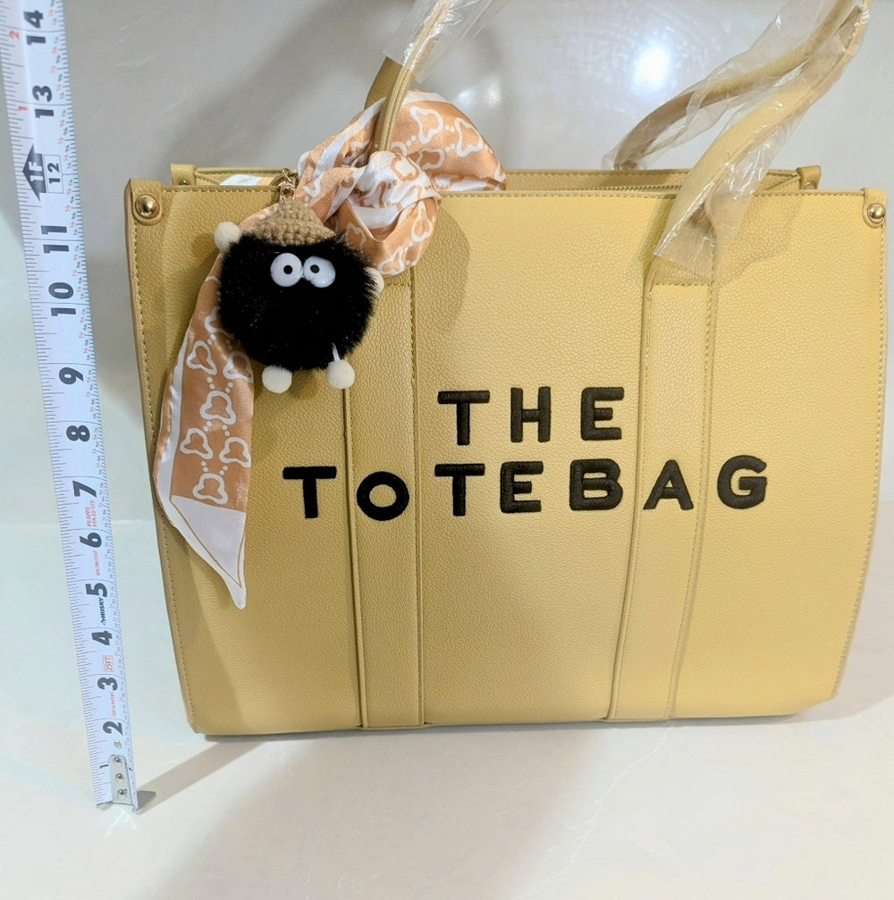 Beige Faux Leather Tote Bag with Decorative Scarf and Charm