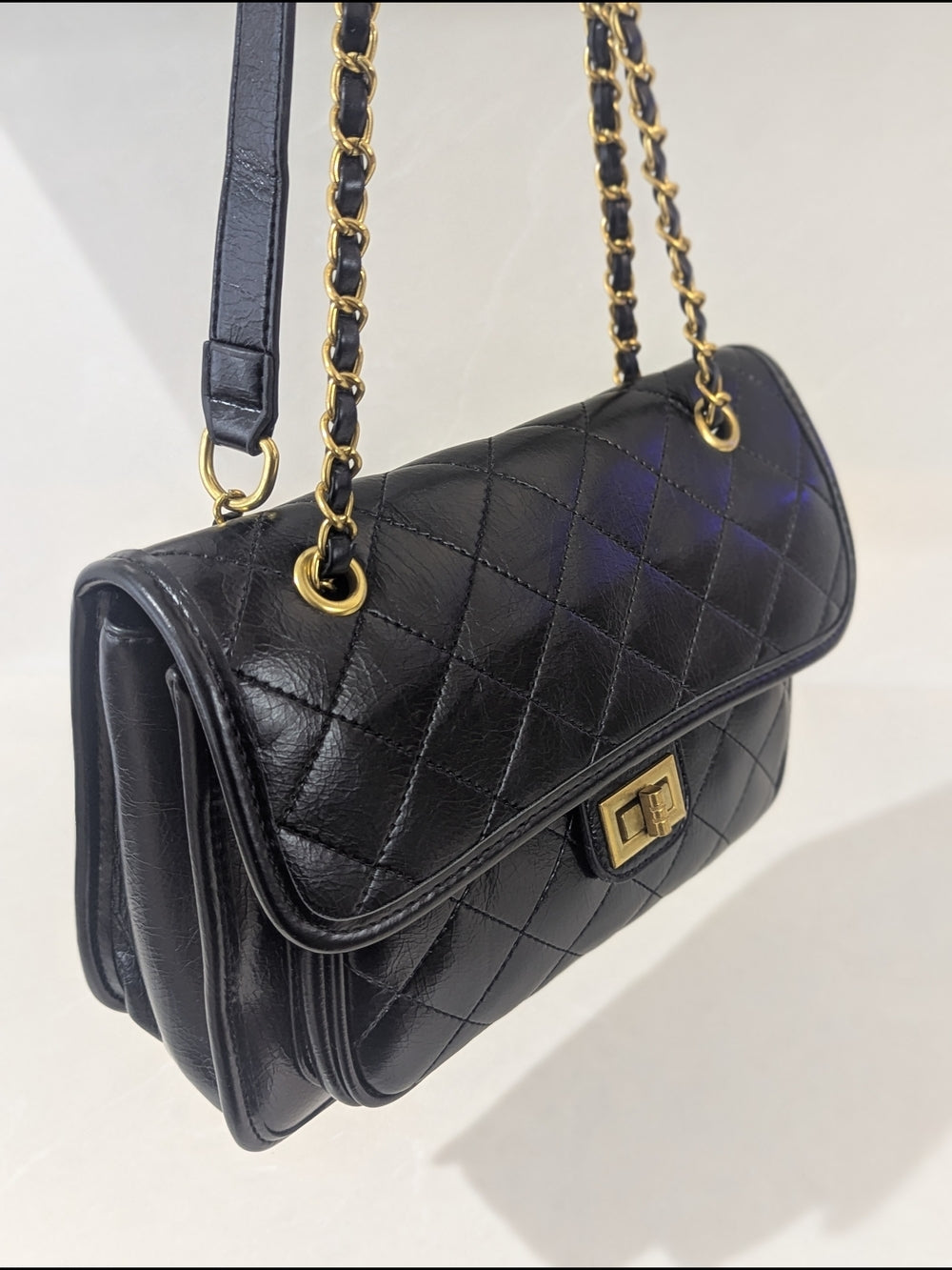 Viney Black Quilted Leather Handbag with Gold Chain Strap