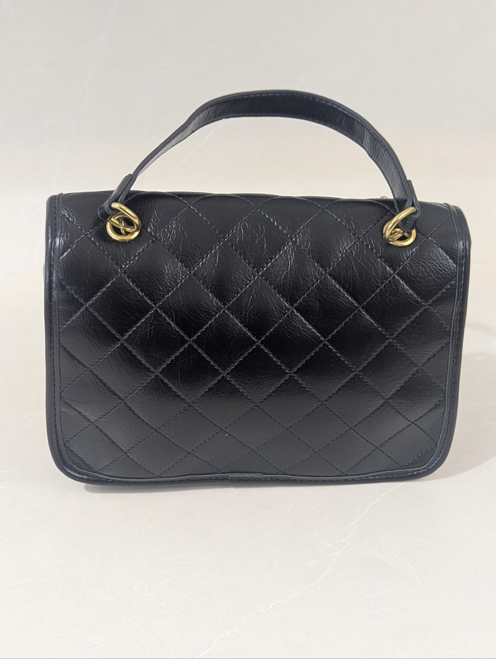 Viney Black Quilted Leather Handbag with Gold Chain Strap